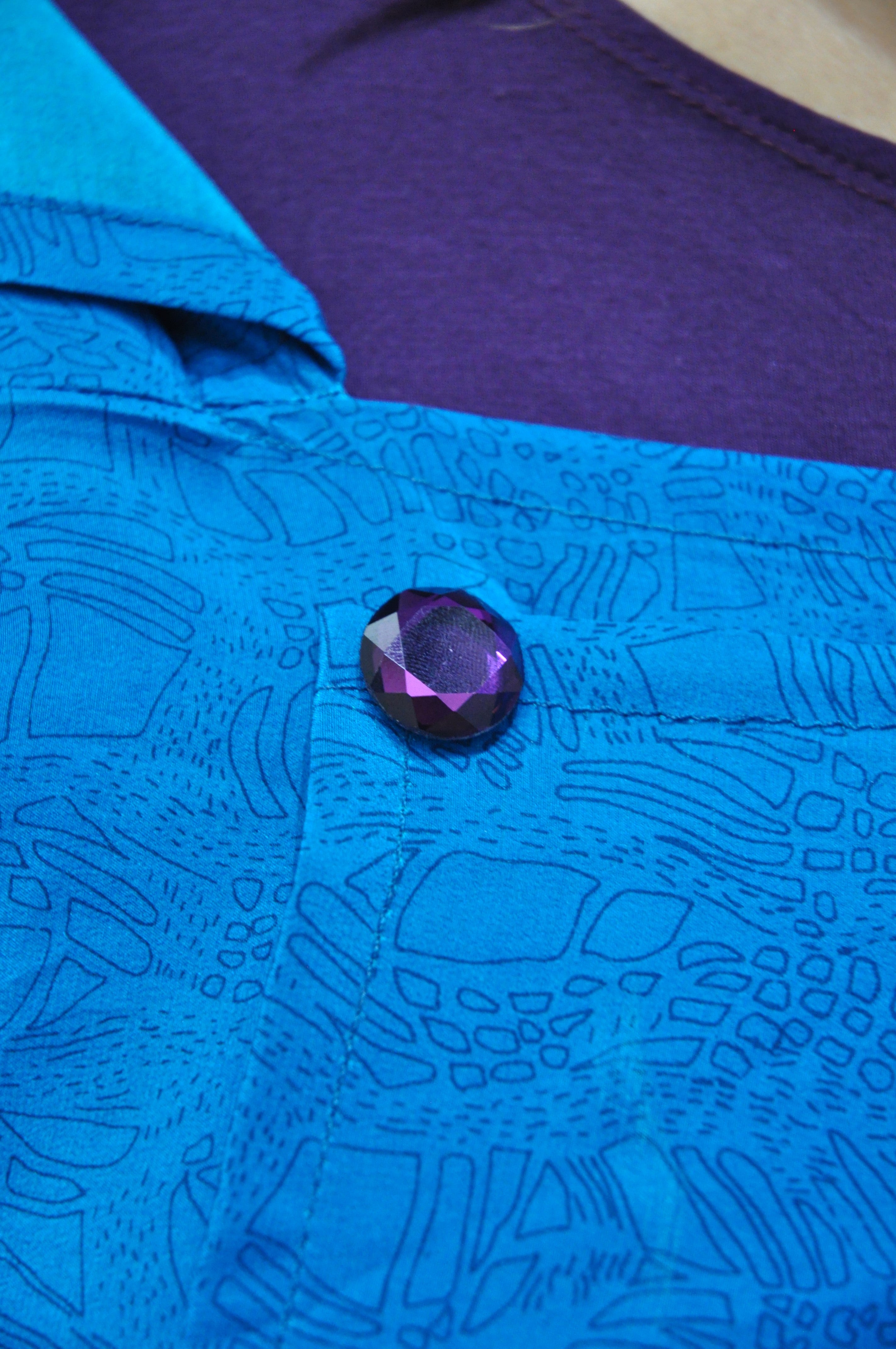 Opaque Faceted Purple Glass Magnetic Button