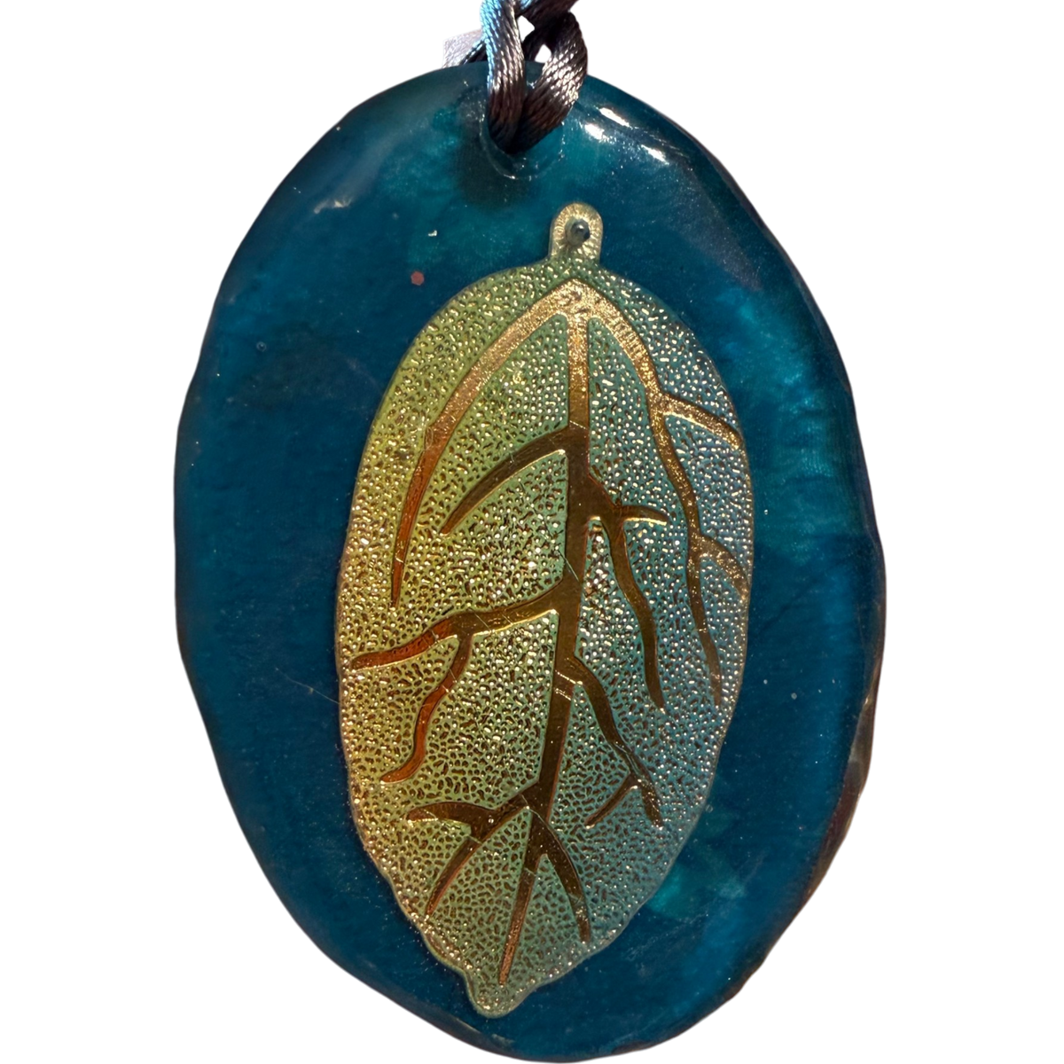 Releases Sunday at 8pm EST Glimmering Leaf Pendant