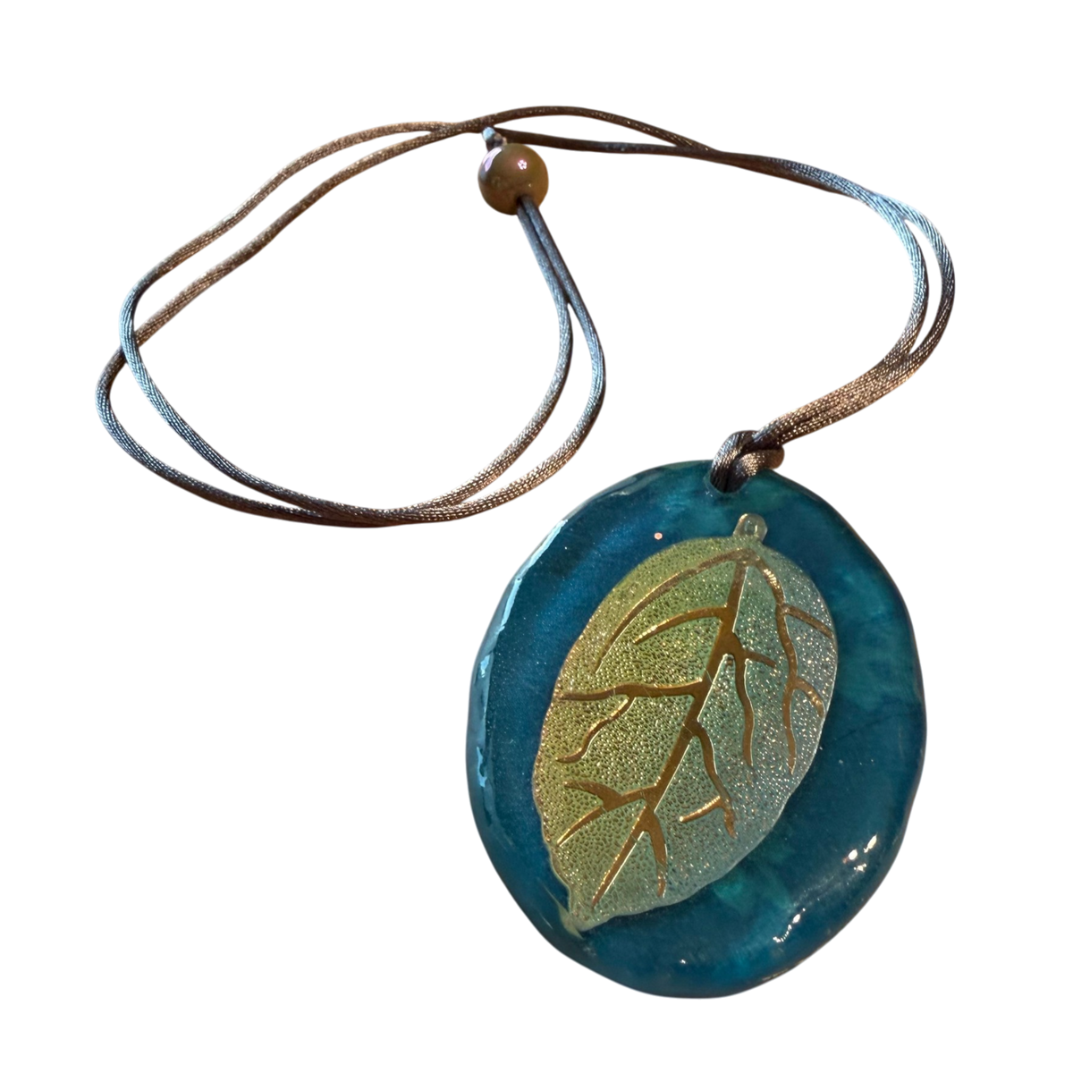 Releases Sunday at 8pm EST Glimmering Leaf Pendant