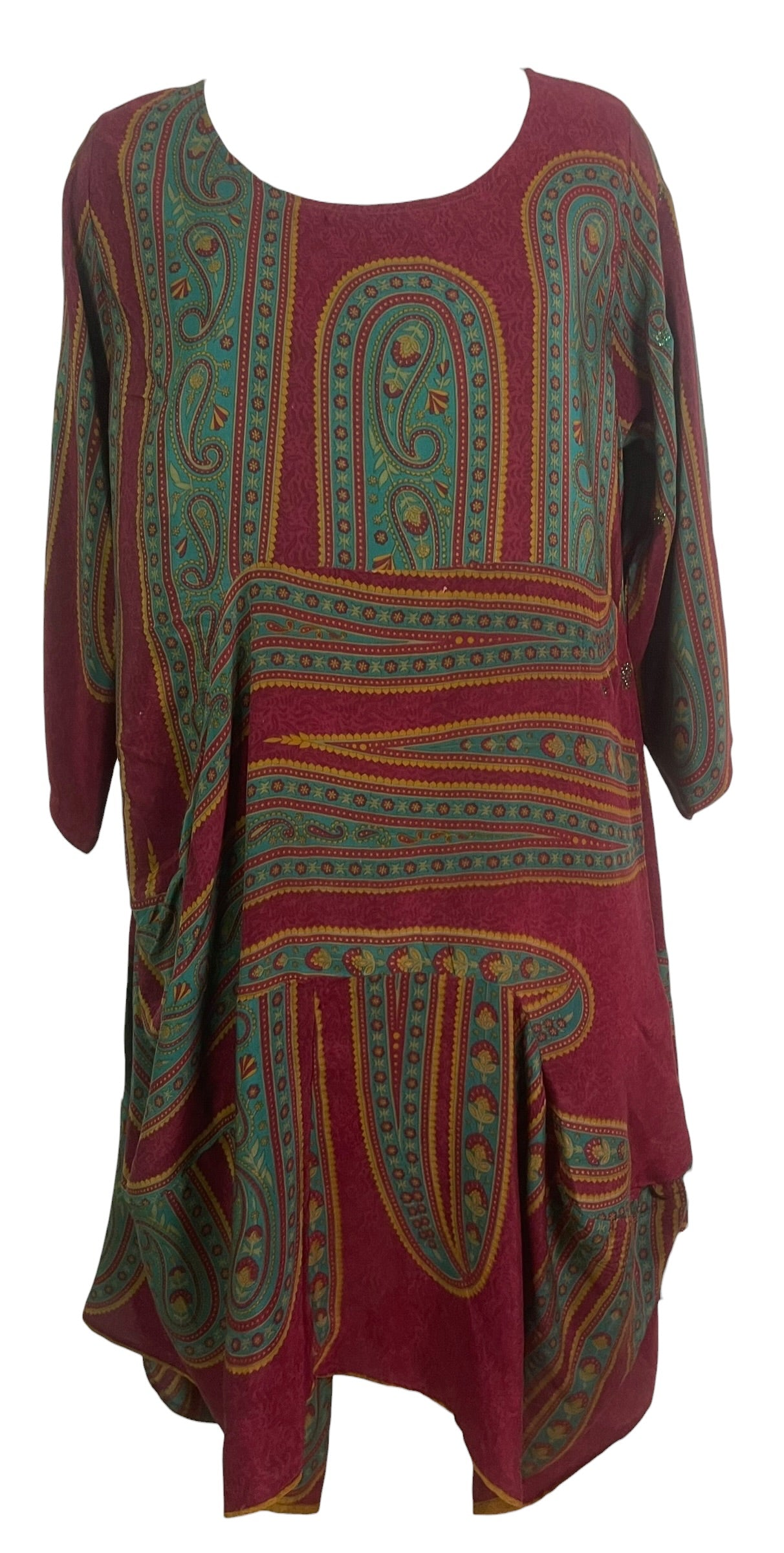 Red dress with green and gold patterns on a white background