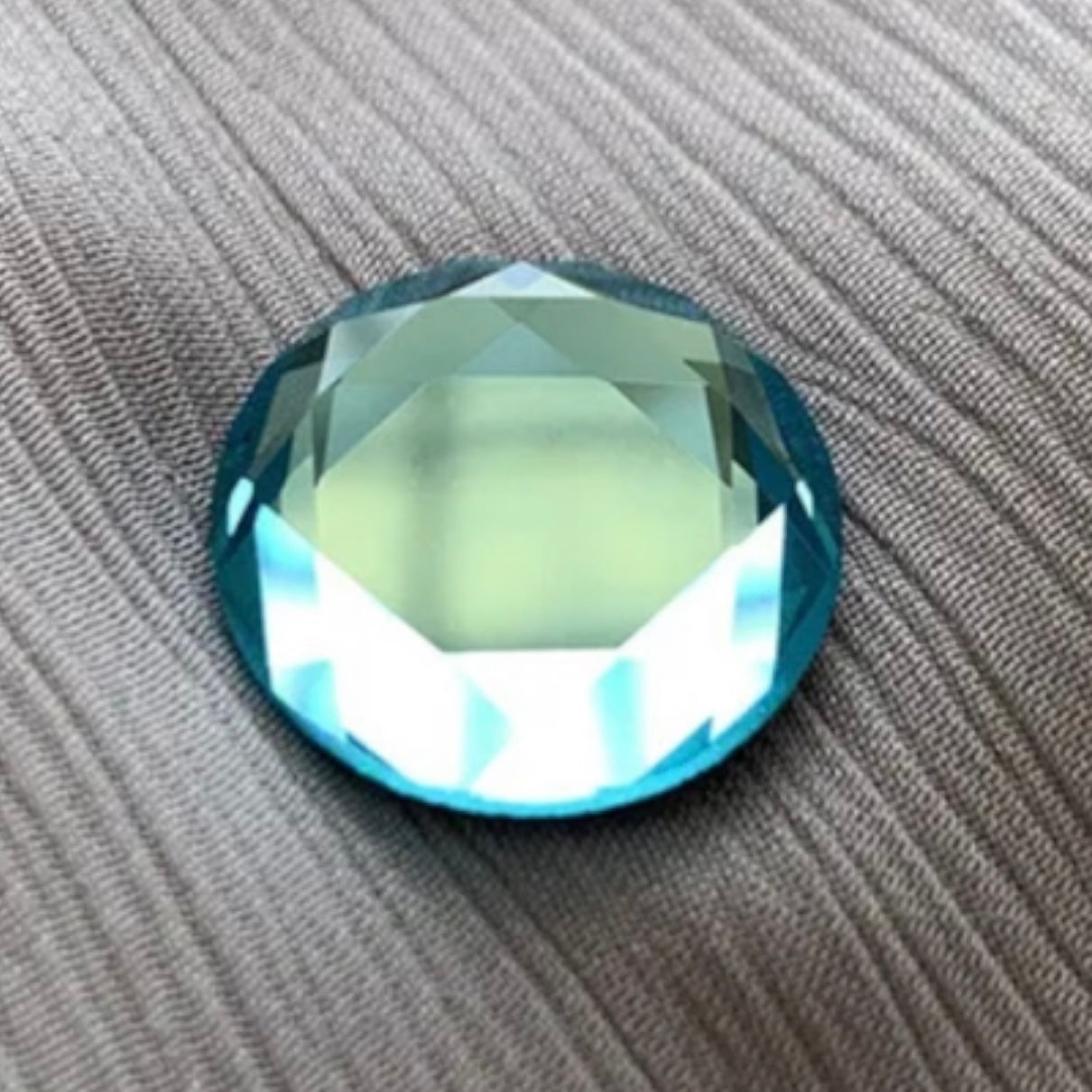 Opaque Faceted Cyan Glass Magnetic Button by Magnet – Handmade ethical Brooch from sariKNOTsari using upcycled silk. Designed in Canada for travel and slow fashion, loved from Toronto to LA to Sydney. Featuring Zsiska, Bryn Walker and Artisan Leather coats by Rejean Pepin, Pepin designs