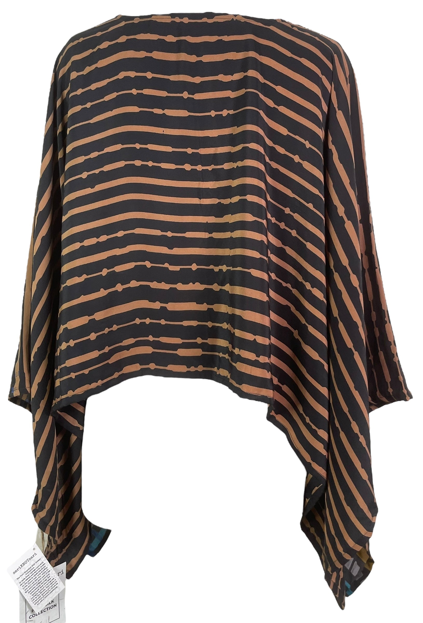 PREVIEW PRC7977 Avatar Pure Silk Capelet Poncho by DECEMBER2025 – Handmade ethical Poncho from sariKNOTsari using upcycled silk. Designed in Canada for travel and slow fashion, loved from Toronto to LA to Sydney.