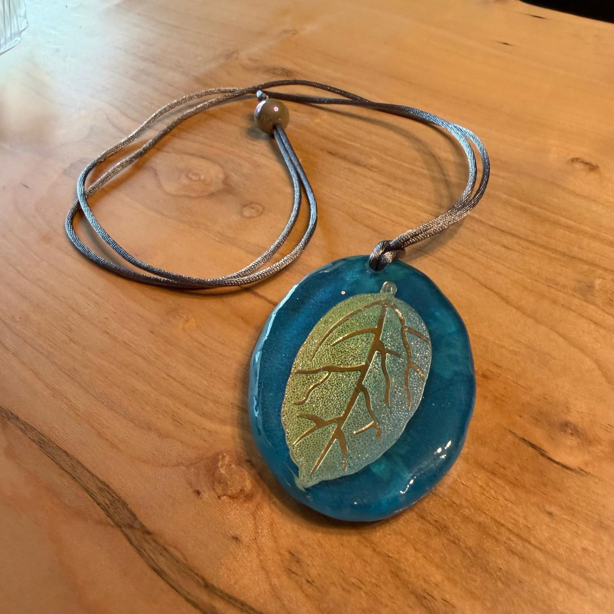 Releases Sunday at 8pm EST Glimmering Leaf Pendant