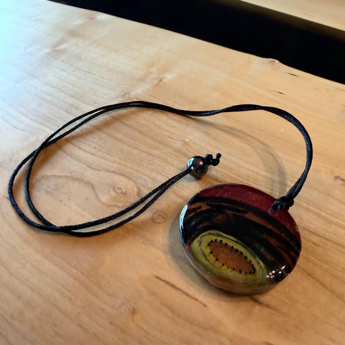Releases Sunday at 8pm EST Around We Go Pendant