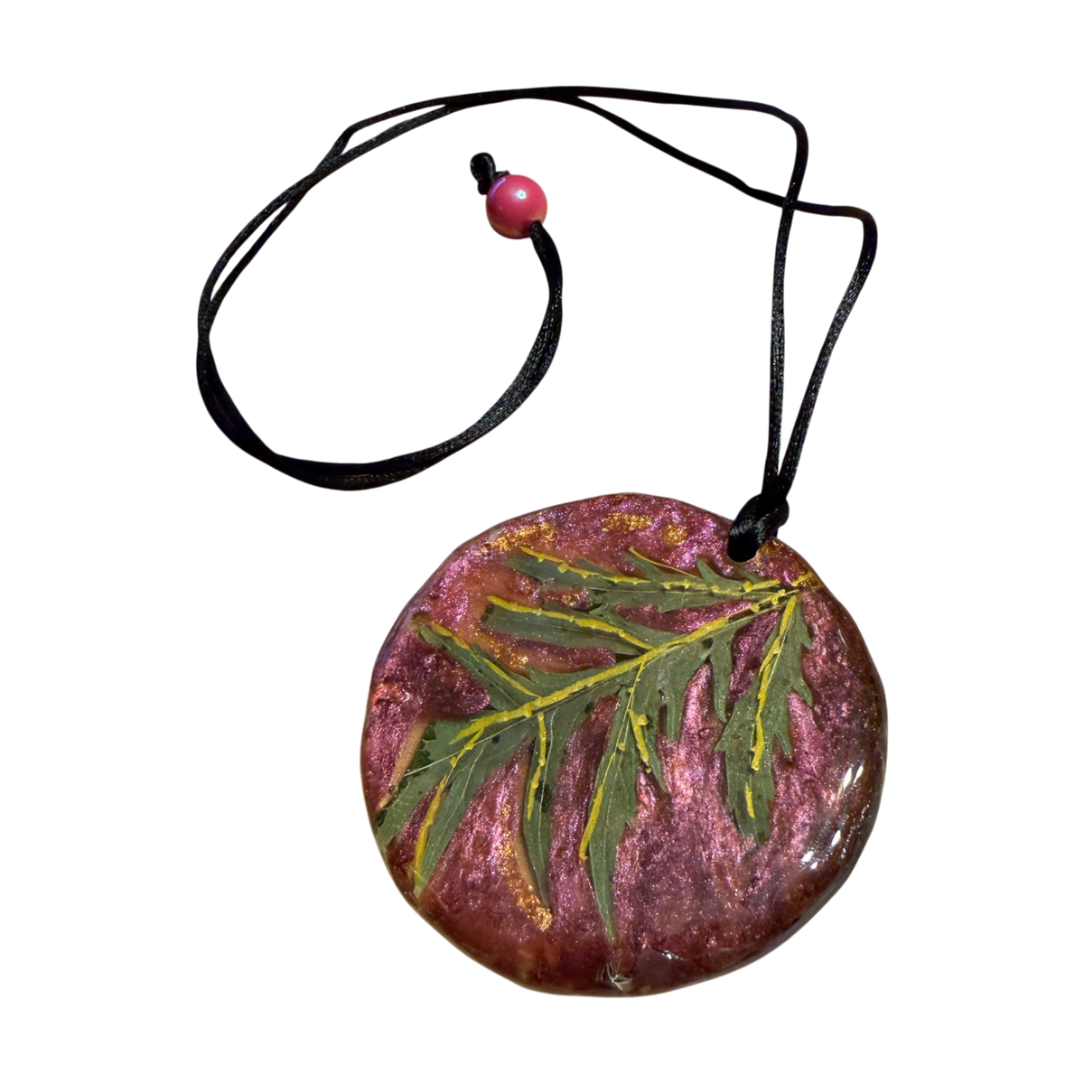 Lacy Leaf Pendant by Kristine’s Kreations – Handmade ethical Necklace from sariKNOTsari using upcycled silk. Designed in Canada for travel and slow fashion, loved from Toronto to LA to Sydney. Featuring Zsiska, Bryn Walker and Artisan Leather coats by Rejean Pepin, Pepin designs