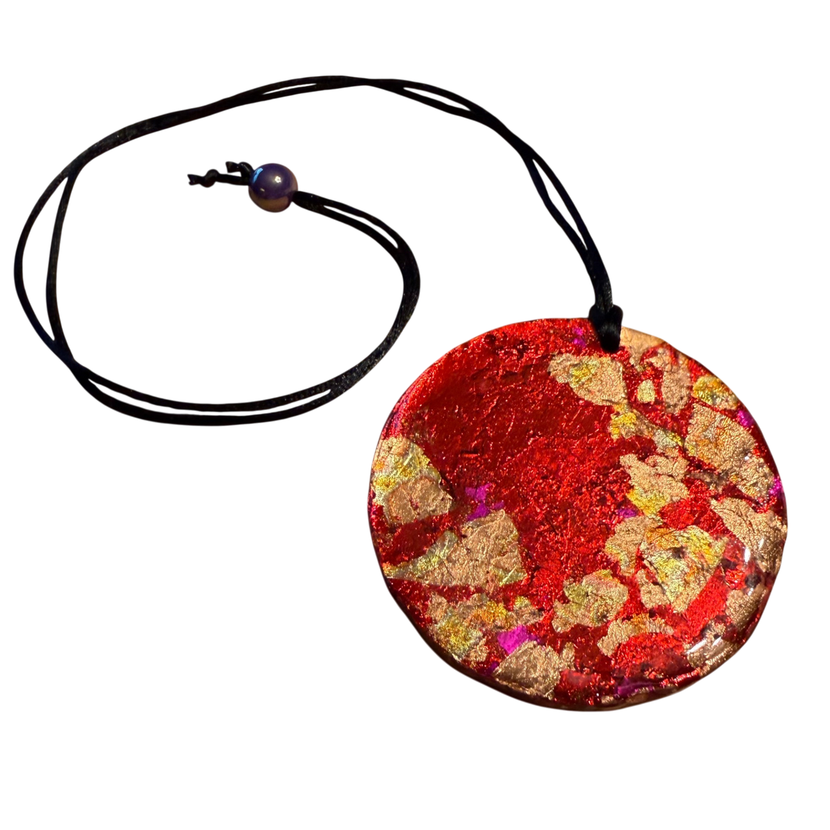 Lava Flow Pendant by Kristine’s Kreations – Handmade ethical Necklace from sariKNOTsari using upcycled silk. Designed in Canada for travel and slow fashion, loved from Toronto to LA to Sydney. Featuring Zsiska, Bryn Walker and Artisan Leather coats by Rejean Pepin, Pepin designs