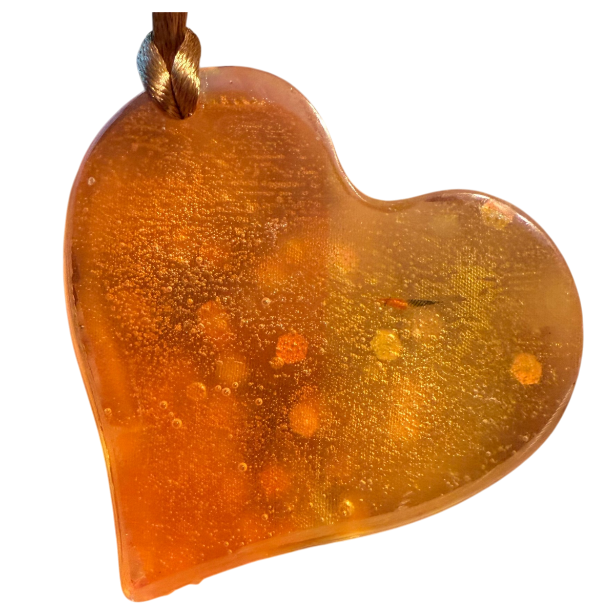 Happy Heart Pendant by Kristine’s Kreations – Handmade ethical Necklace from sariKNOTsari using upcycled silk. Designed in Canada for travel and slow fashion, loved from Toronto to LA to Sydney. Featuring Zsiska, Bryn Walker and Artisan Leather coats by Rejean Pepin, Pepin designs