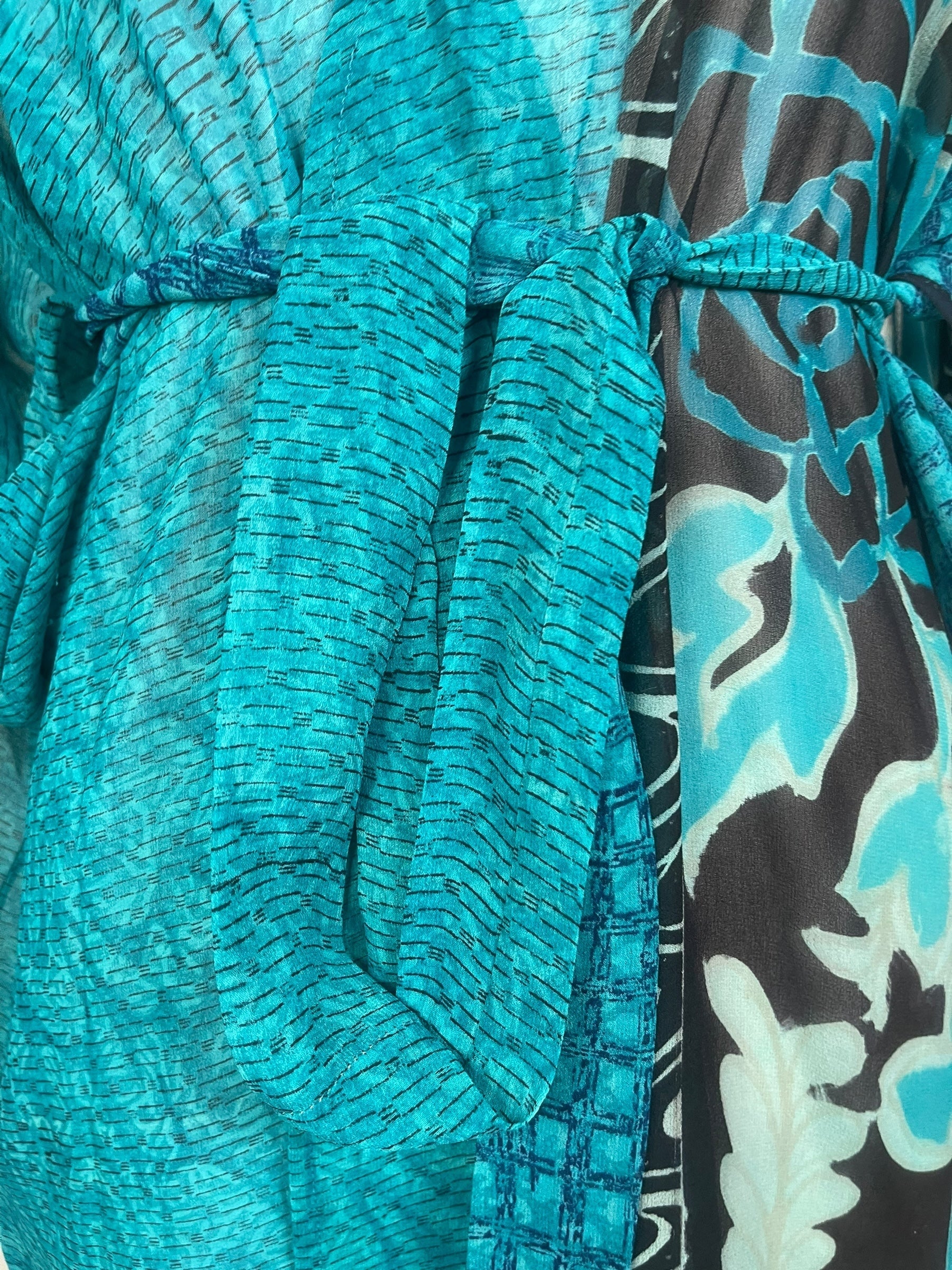 PREVIEW PRG8535 Sheer Wabi Sabi Pure Silk Kimono-Sleeved Jacket with Belt by MARCH2026 – Handmade ethical Short Kimono from sariKNOTsari using upcycled silk. Designed in Canada for travel and slow fashion, loved from Toronto to LA to Sydney. Featuring Zsiska, Bryn Walker and Artisan Leather coats by Rejean Pepin, Pepin designs