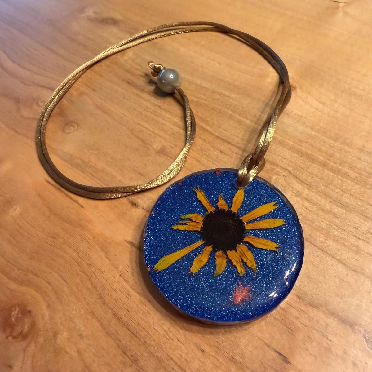 Susan Pendant by Kristine’s Kreations – Handmade ethical Necklace from sariKNOTsari using upcycled silk. Designed in Canada for travel and slow fashion, loved from Toronto to LA to Sydney. Featuring Zsiska, Bryn Walker and Artisan Leather coats by Rejean Pepin, Pepin designs